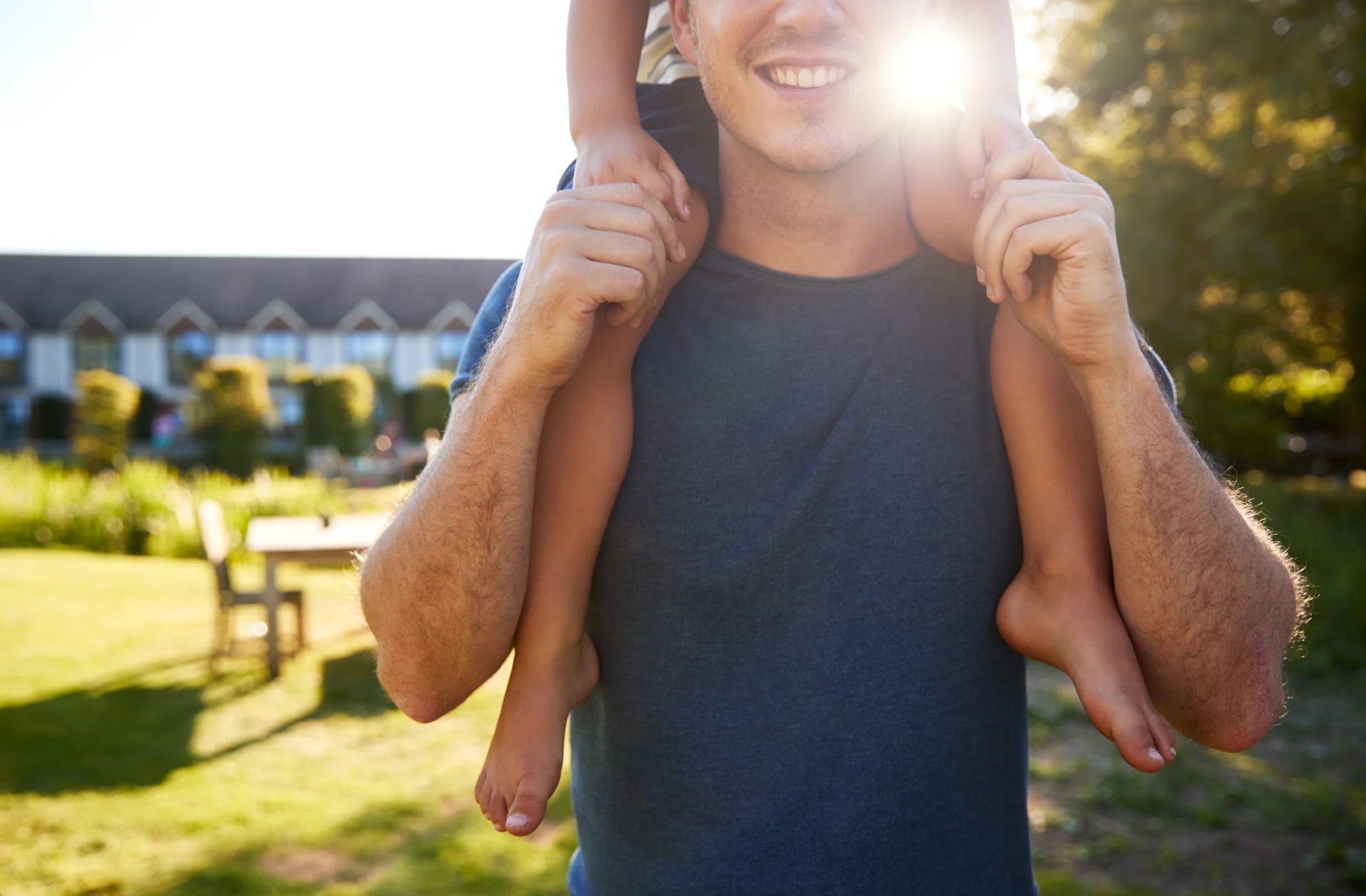 close up of father giving son ride on shoulders in 2026 01 05 22 51 06 utc