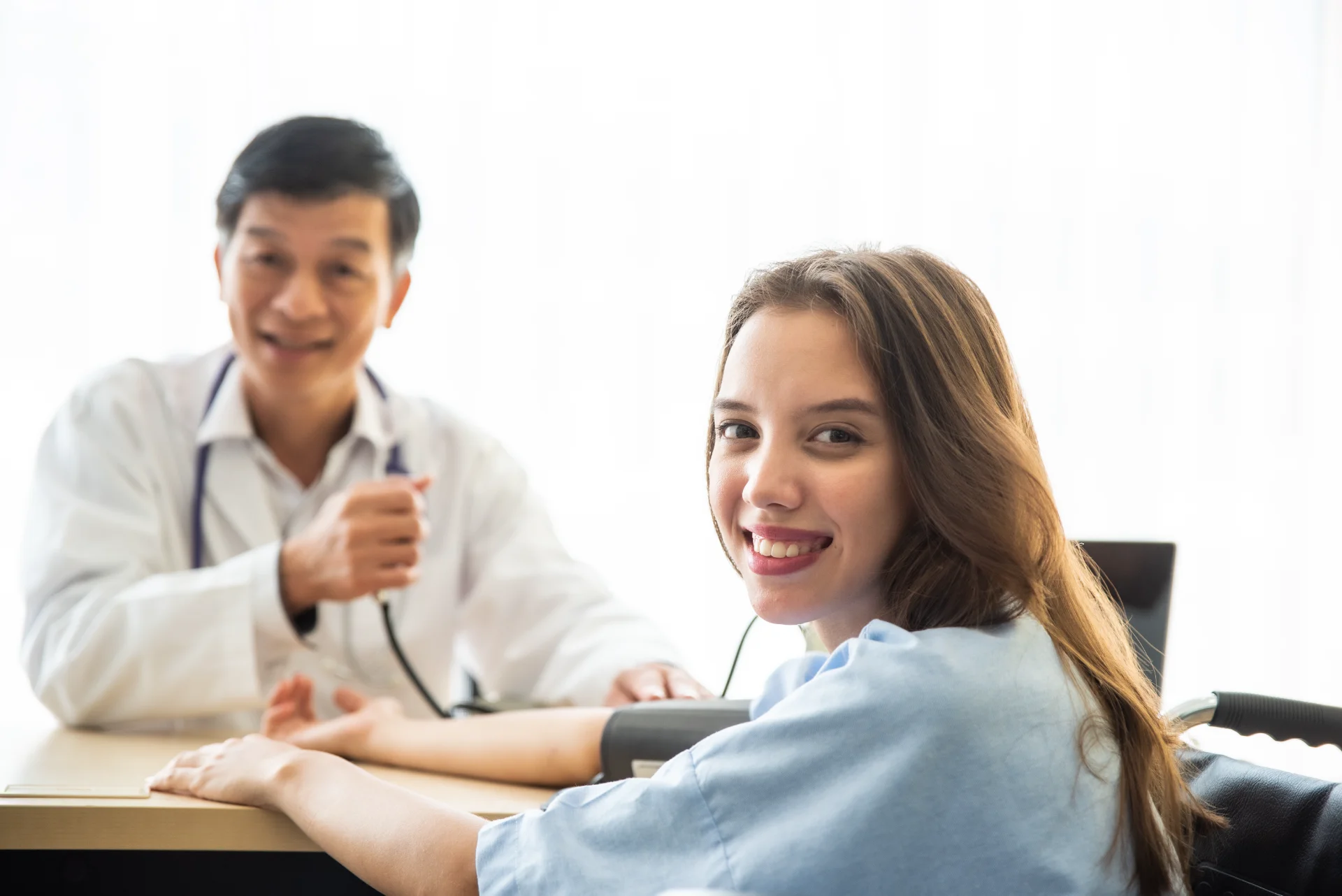 doctor checking blood pressure of patient at medic 2026 03 26 06 25 51 utc