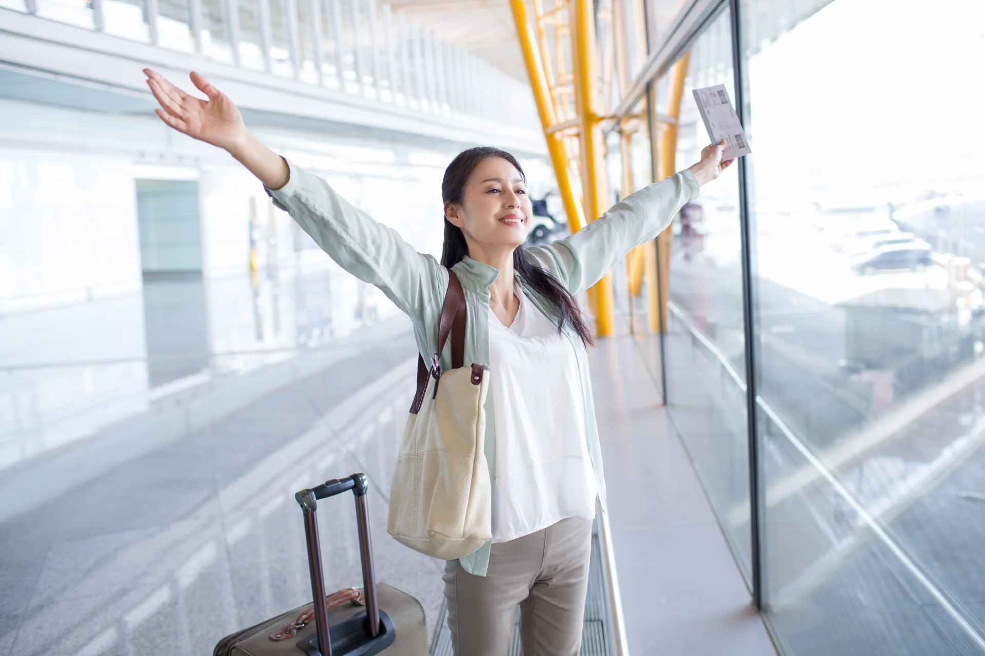 mature woman waiting at airport 2026 03 09 22 25 38 utc