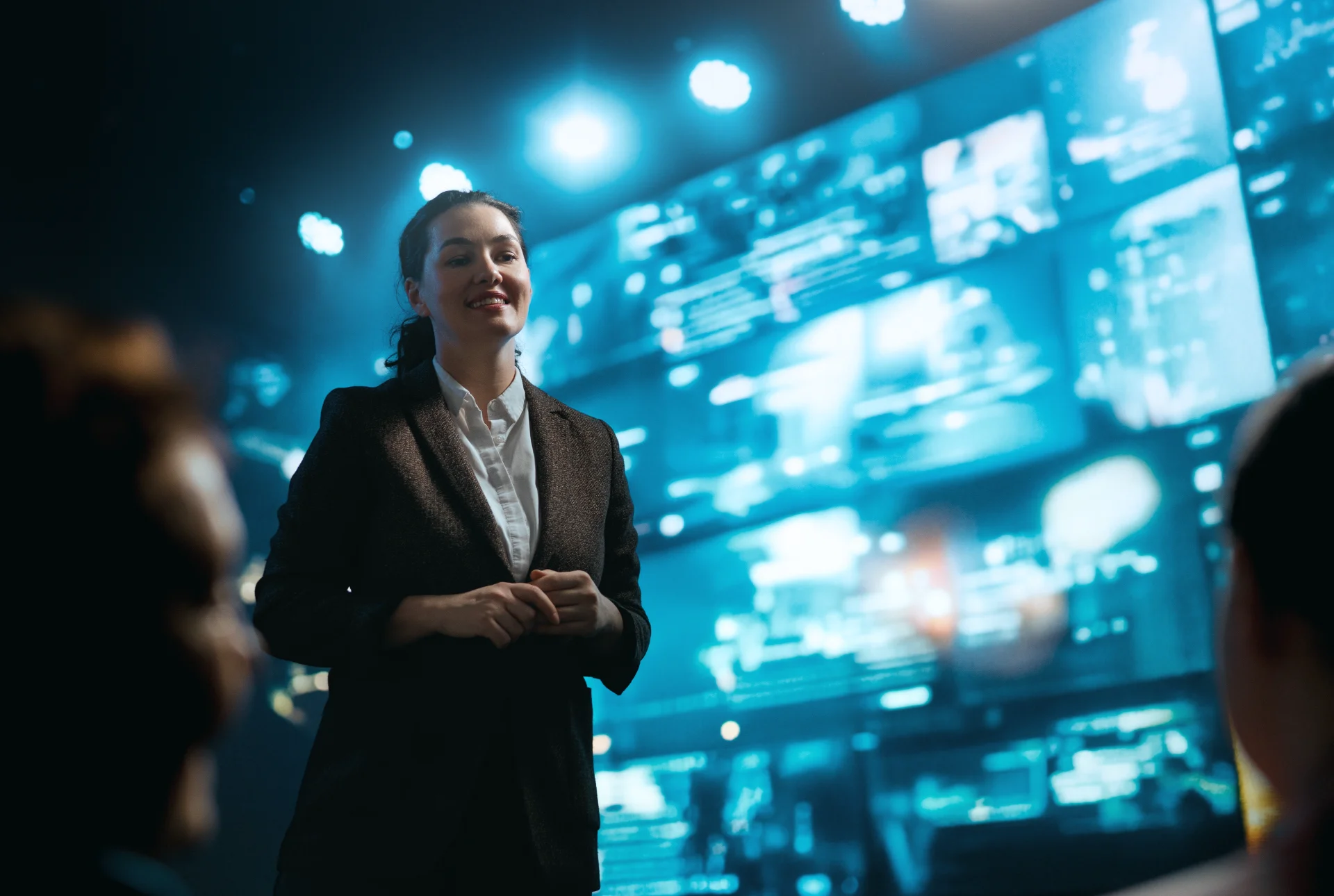 woman presents data on large digital screen 2026 03 25 08 21 31 utc